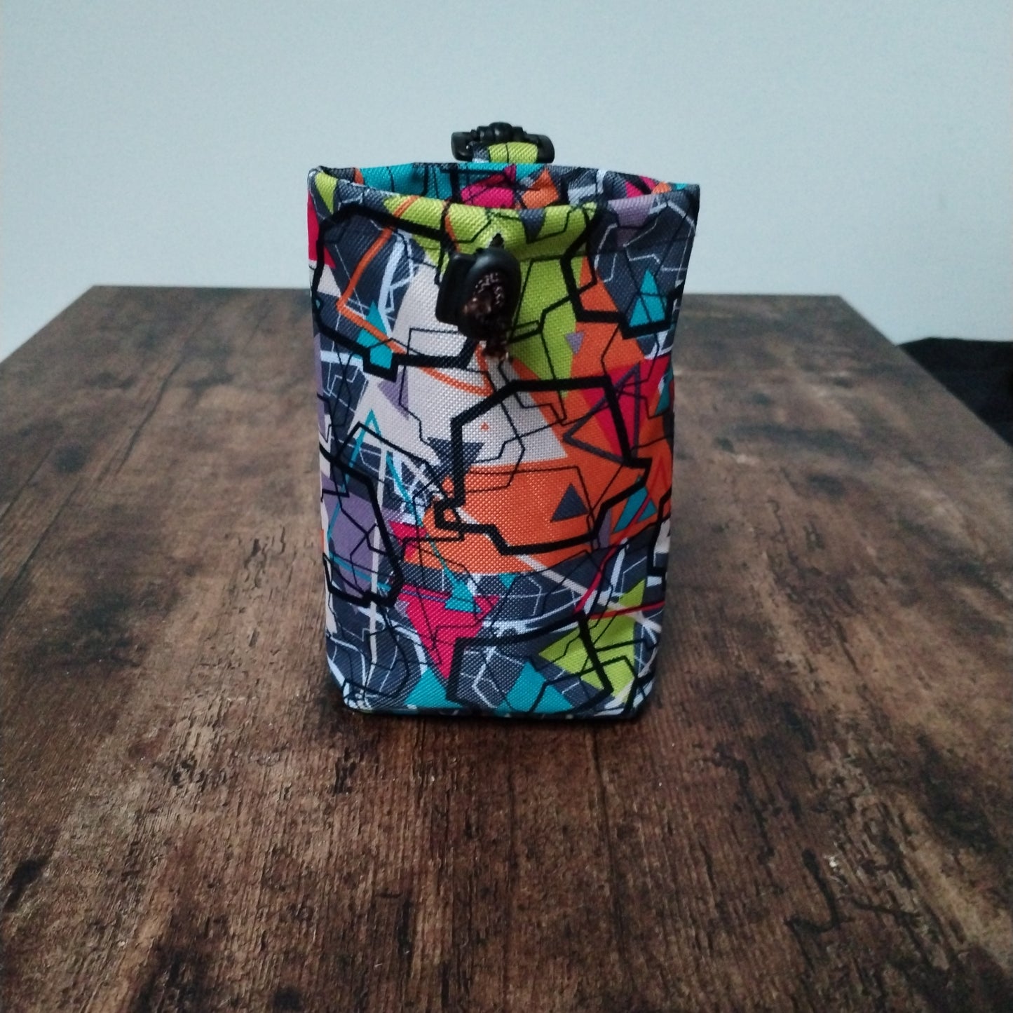 Small multi coloured treat bag.