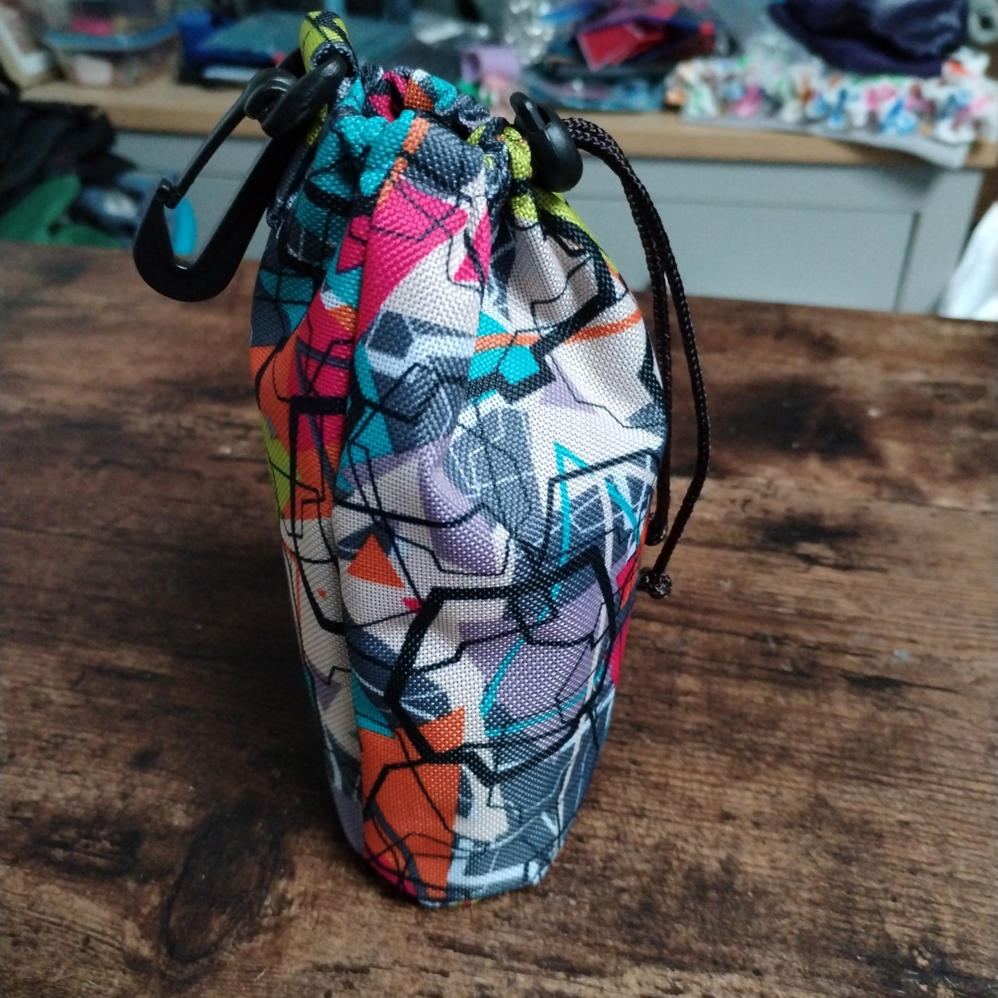 Small multi coloured treat bag.