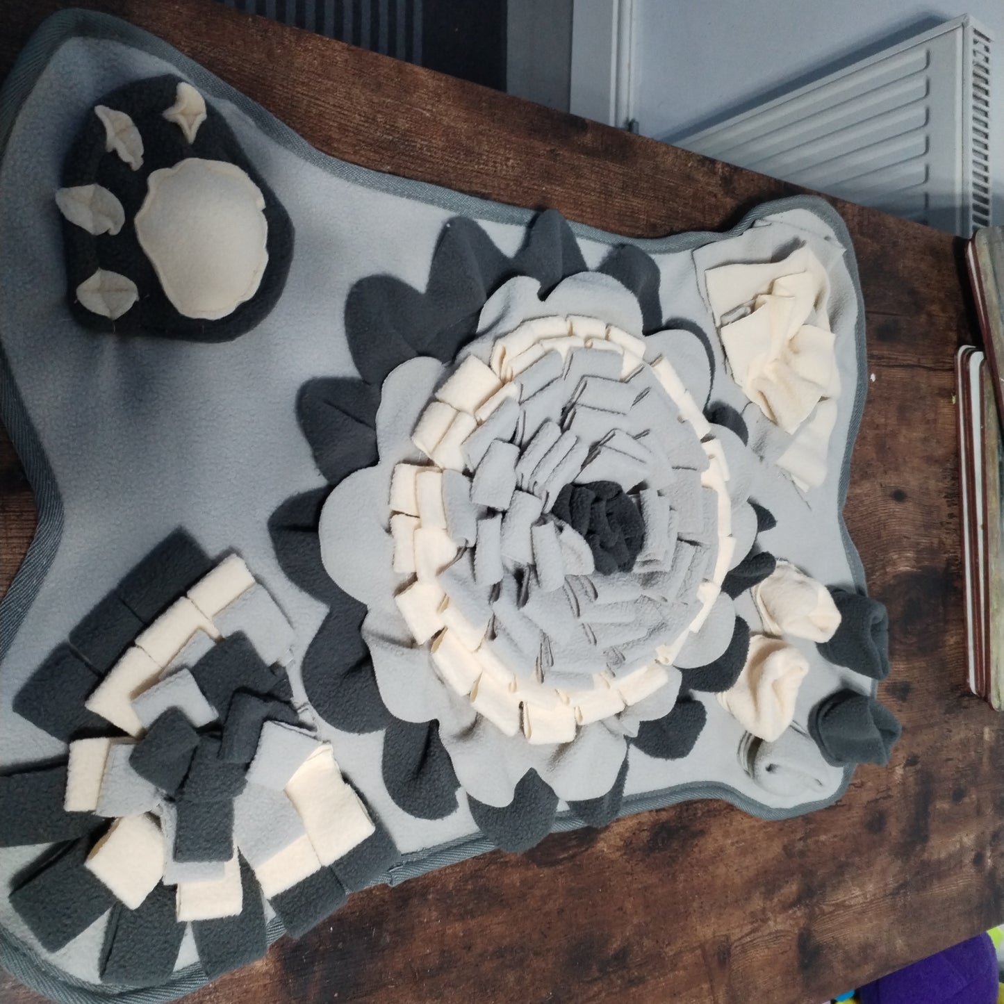 Grey Bone Shaped Activity Mat.