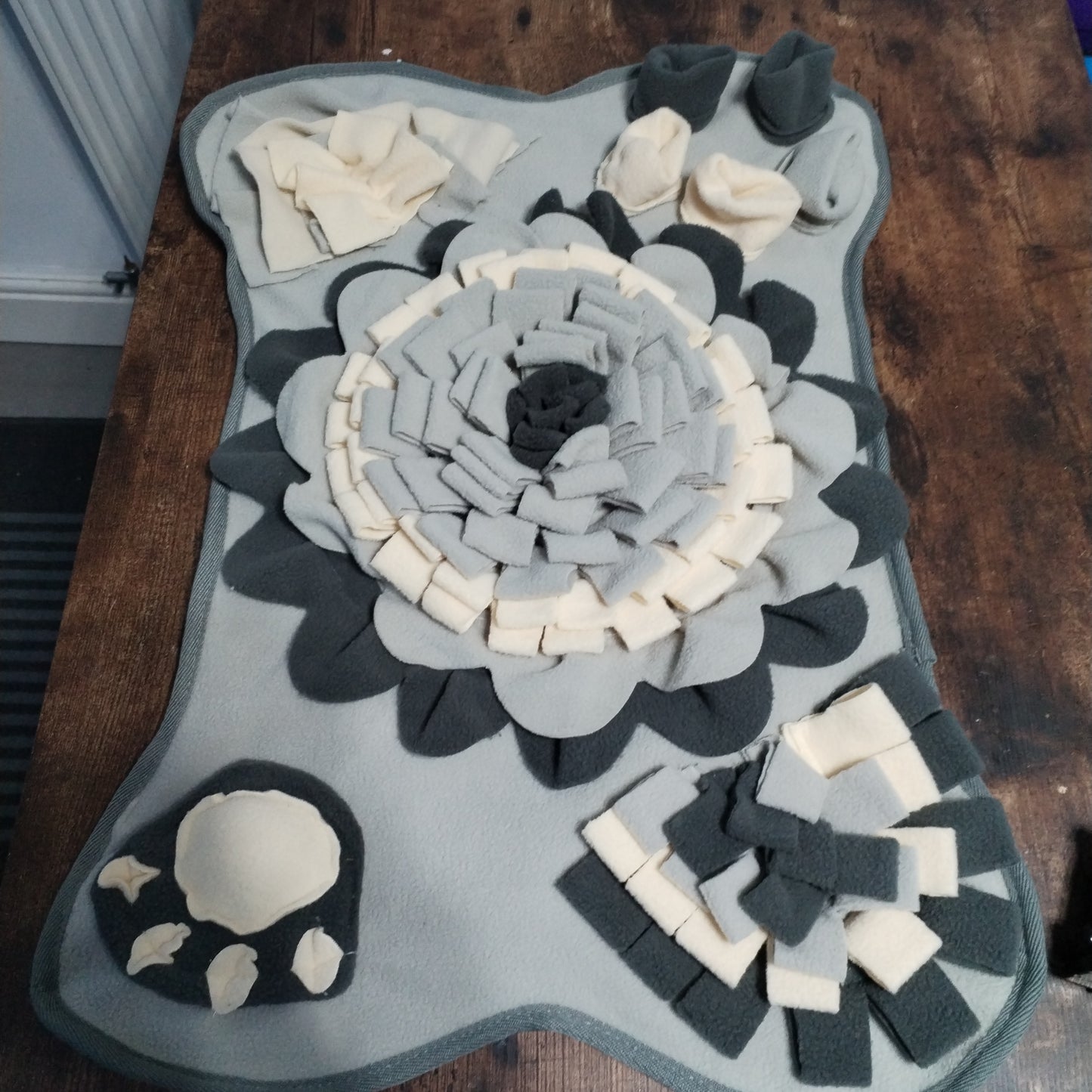 Grey Bone Shaped Activity Mat.