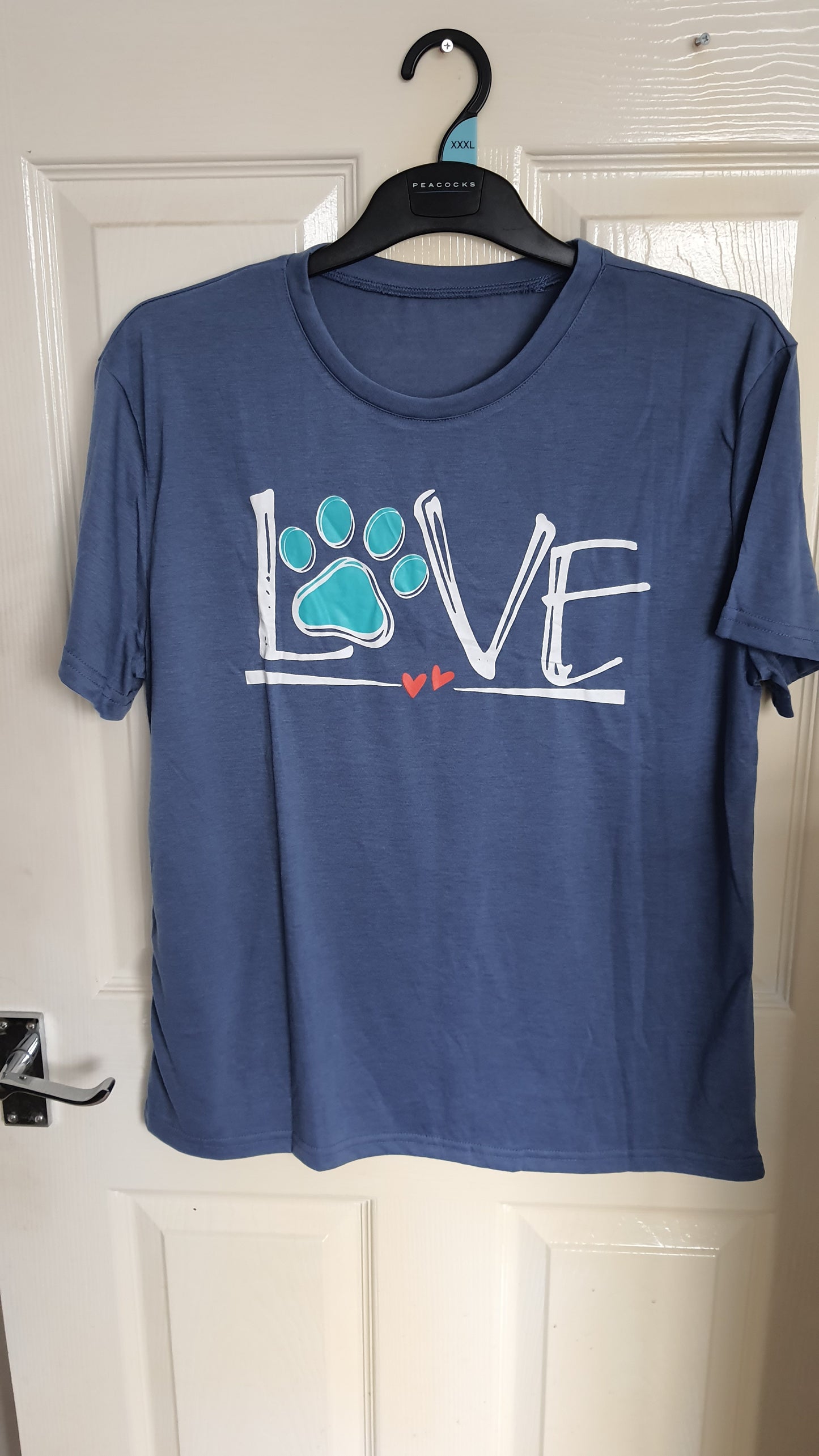 Blue Love paw logo t-shirt.