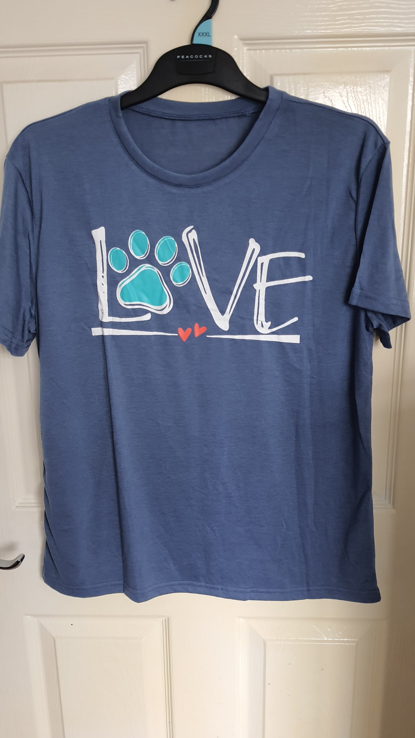 Blue Love paw logo t-shirt.