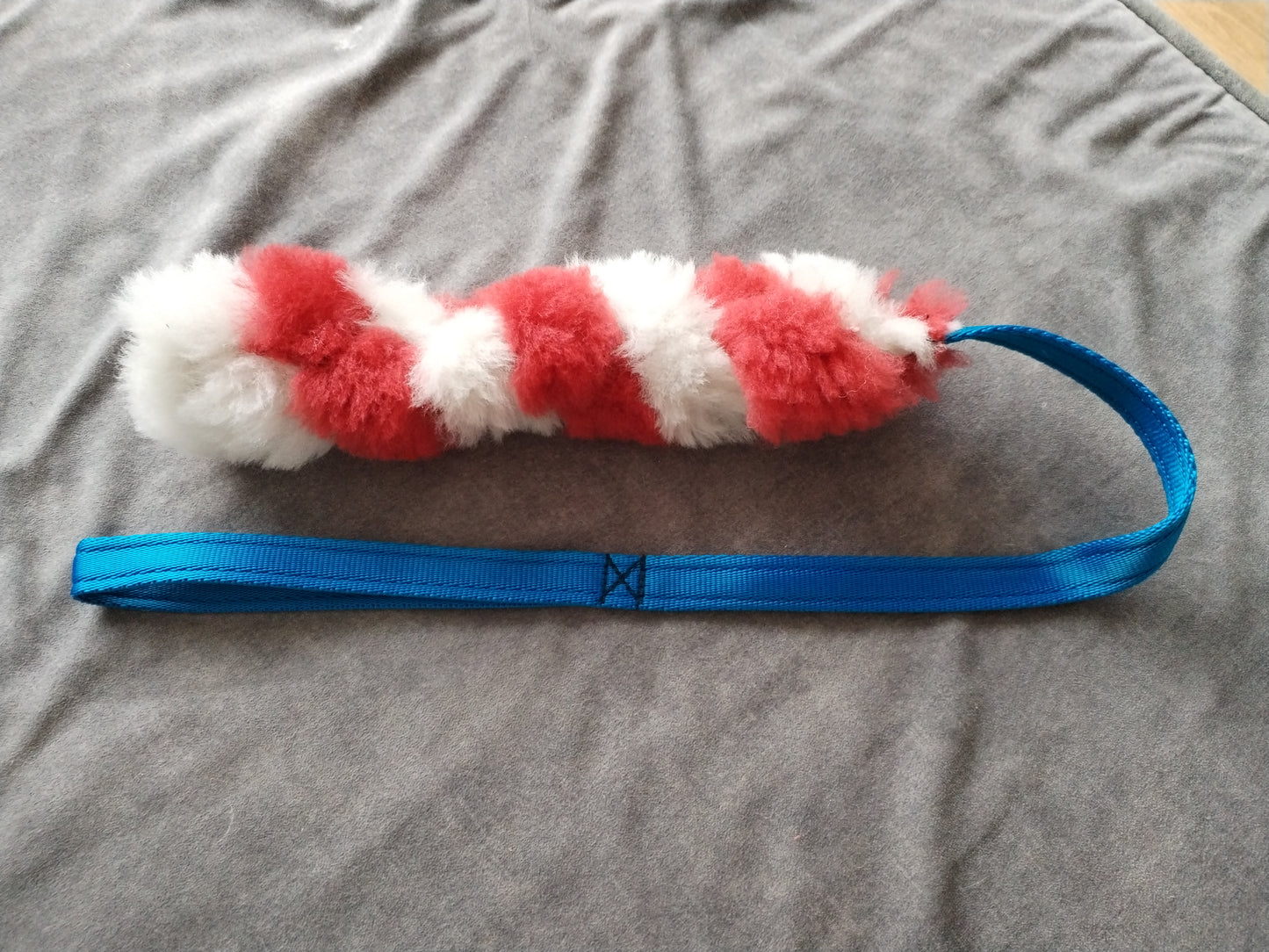 Red and White Sheepskin Tug Toy